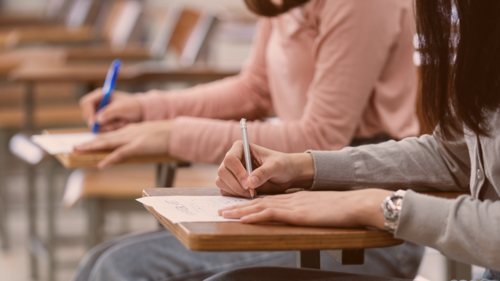 Two students writing exam